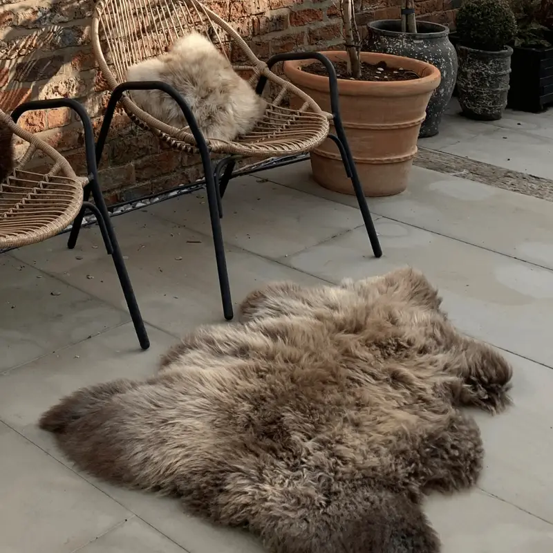 rare Breed sheepskin rug outside on a patio