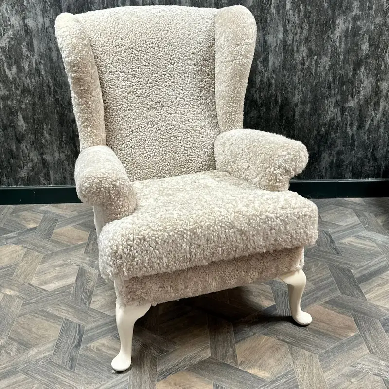 Sheepskin rocking chair and matching stool