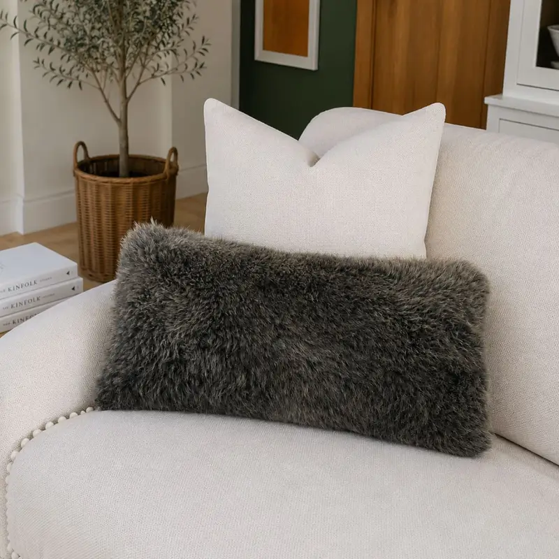 Rare Breed Bolster Cushion 12 on a sofa