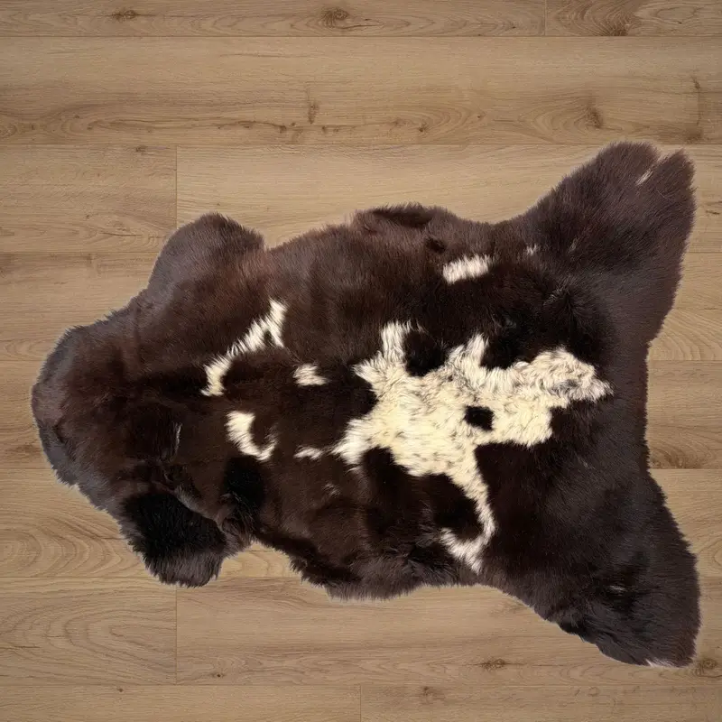 A rich, deep mocha colour with ivory mottling and a dense, soft pile.