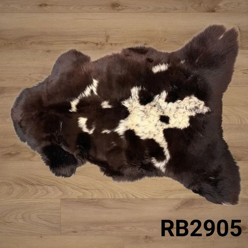 A rich, deep mocha colour with ivory mottling and a dense, soft pile with code.