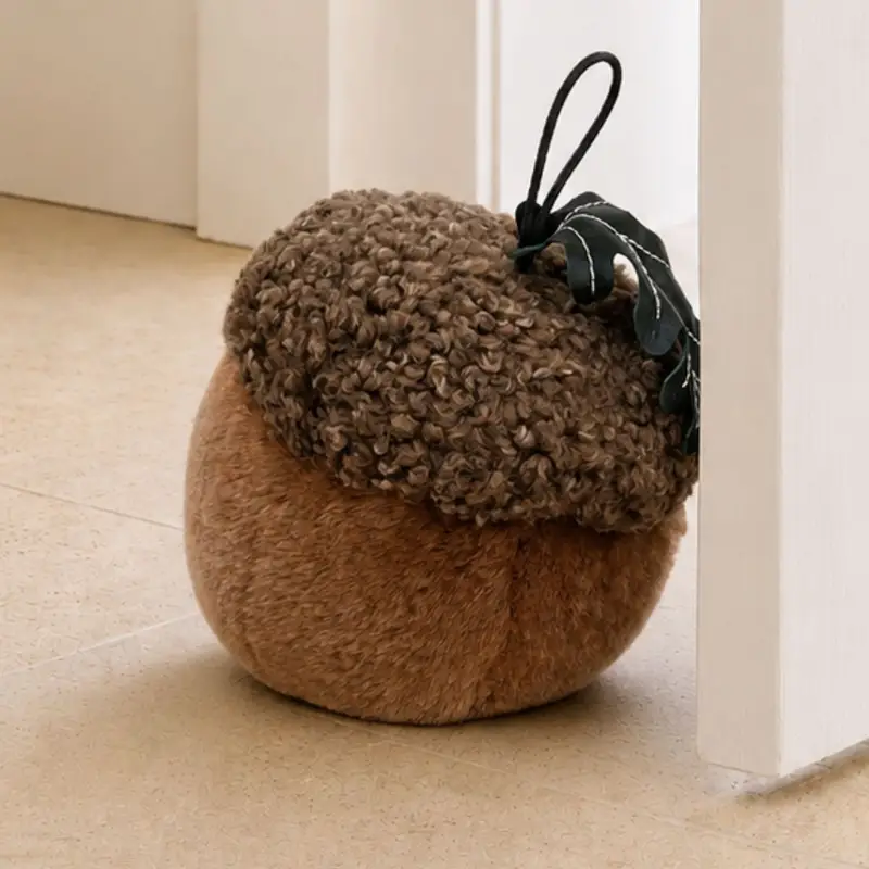 Acorn sheepskin doorstop with cocoa bouclé cap, fawn velvety nut, green leather oak leaf and leather loop stalk
