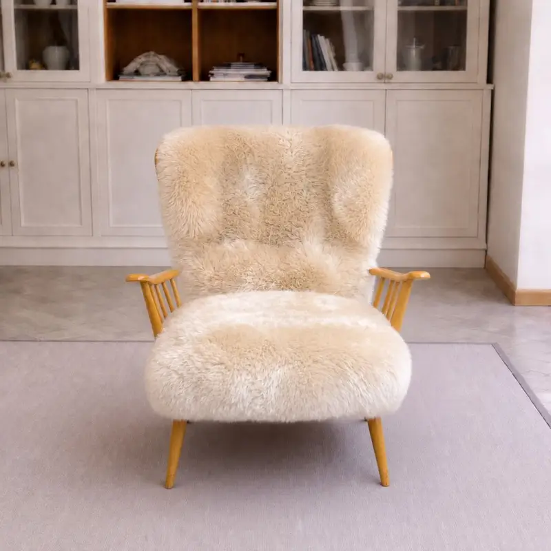 Vintage Ercol Jubilee Easy Chair with Seashell sheepskin cushions