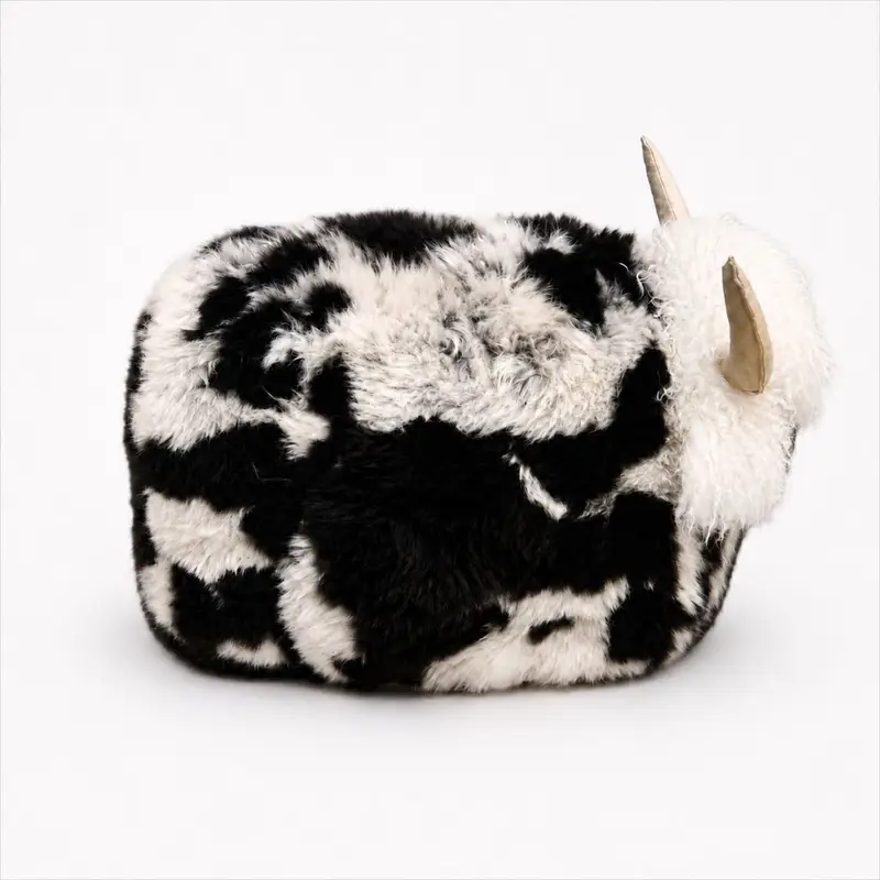 Side view 2 of Patch rare breed sheepskin bull pouffe
