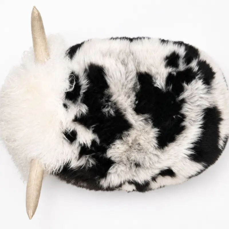 Top of Jacob sheepskin bull footstool with cream leather horns and nose