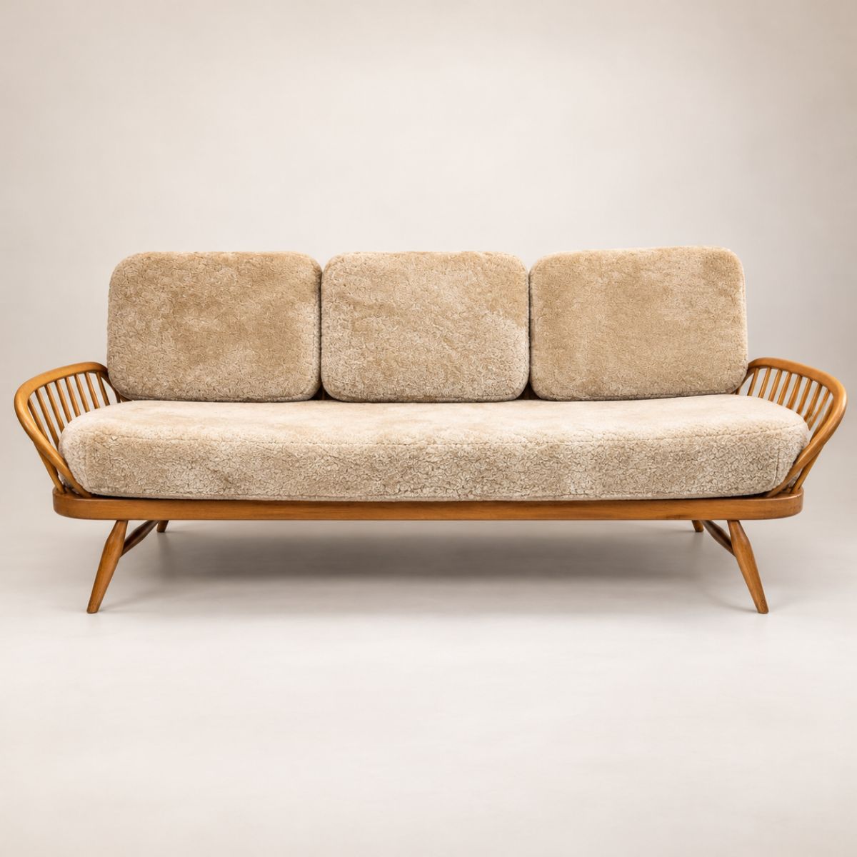 Ercol Windsor 355 Studio Couch imagined in Eggshell sheepskin
