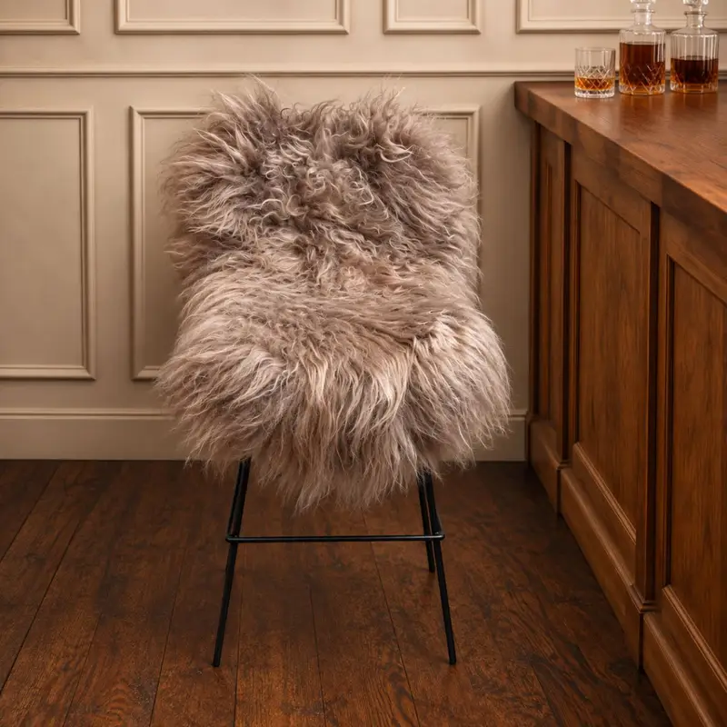 Natural Icelandic sheepskin rug with long silky wool in a mushroom colour.