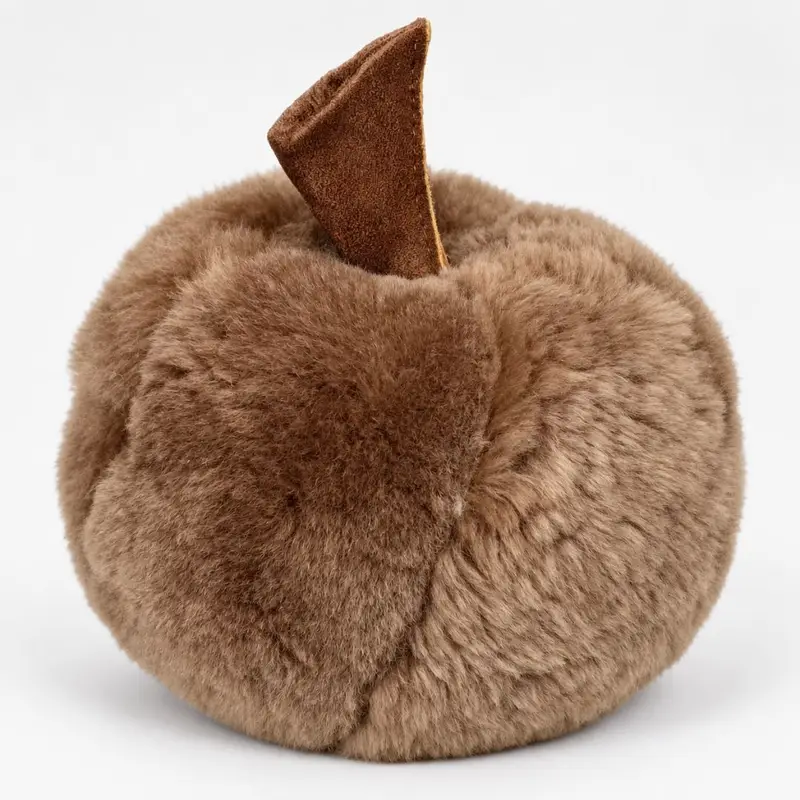 Opposite side view of Doorkin sheepskin pumpkin doorstop